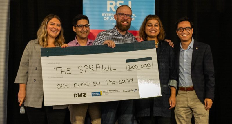 Natasha Campagna (DMZ Sandbox), Ashutosh Syal (DMZ Sandbox), Jeremy Klaszus (The Sprawl), Asmaa Malik (Ryerson School of Journalism), Kevin Chan (Facebook), stand on stage holding a cheque