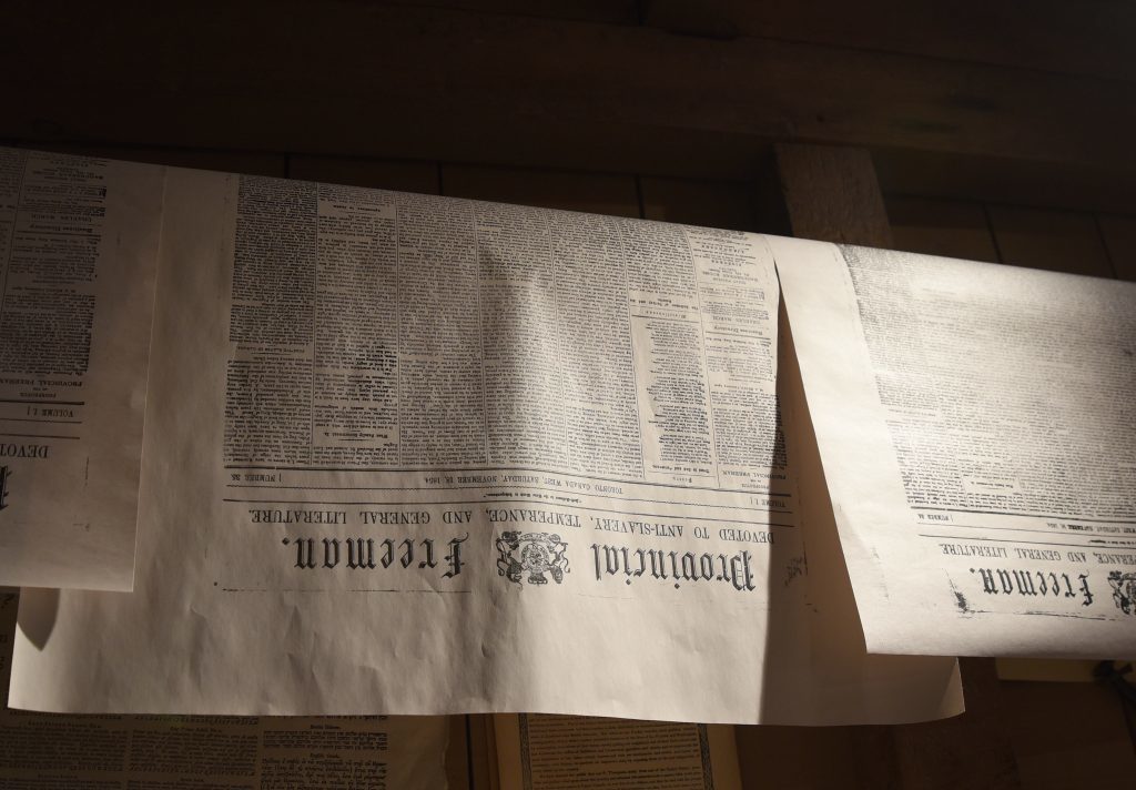 Copies of the Provincial Freeman hang to dry at Mackenzie House.